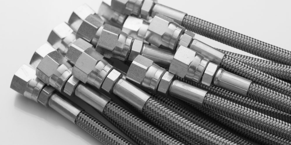 Stainless Steel Hydraulic Hoses on White